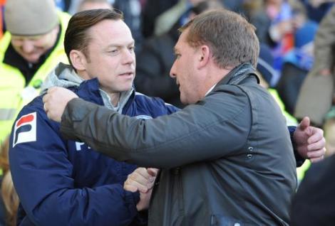 On a famous day in the FA Cup, Paul Dickov and Brendan Rodgers shake hands after 3 Premier League teams are held or beaten by lesser opposition in the FA Cup 4th round. 